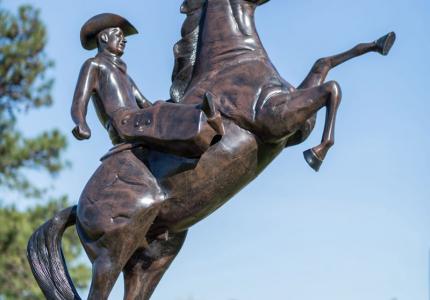 Cowboy on horse statue