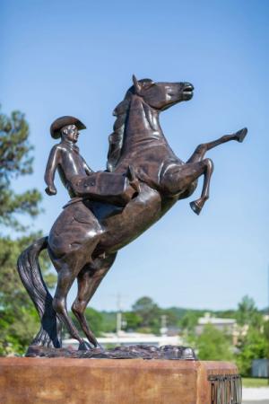 Cowboy on horse statue